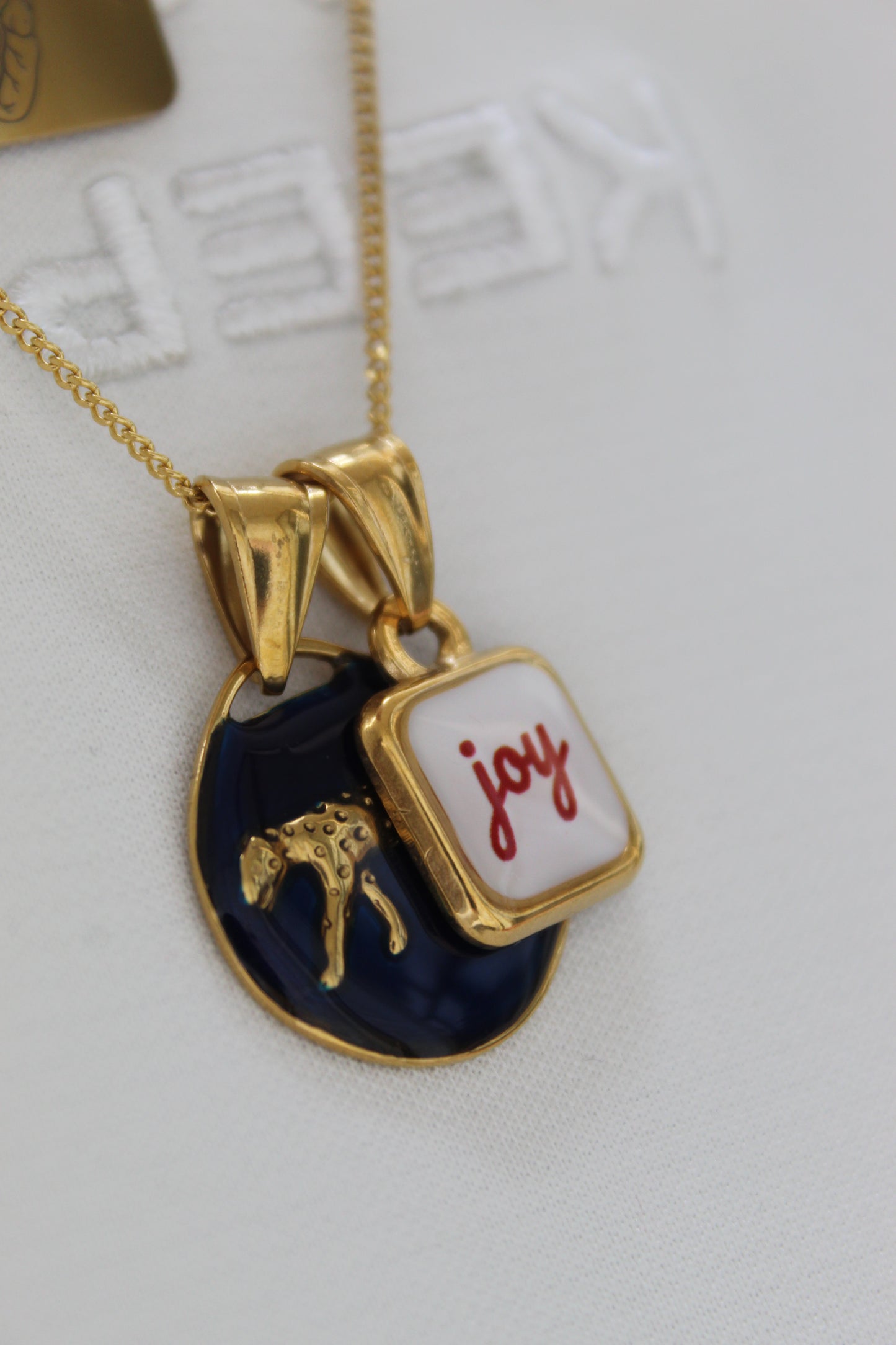 ciondolo JOY.